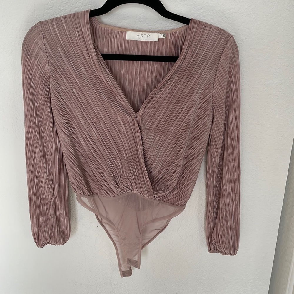 Pink body suit